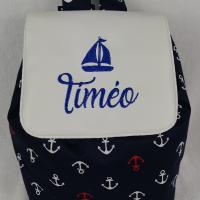 Sac a dos simili blanc bleu marine ancre